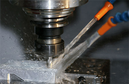 Metal grinding with coolant